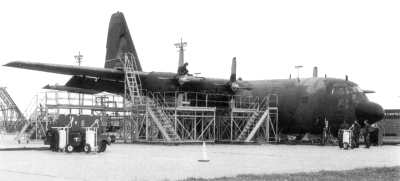 Maintenance on the outside of C-130 of the KyANG
