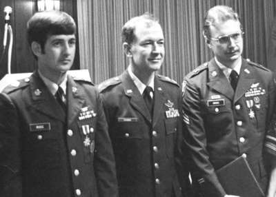 Adjutant General Frymire with Ross, at left, and Cross, at right, after awarding them the Kentucky Medal for Valor
